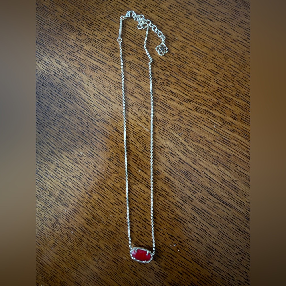 Kendra Scott Alisa Necklace gold with berry pendant for July.